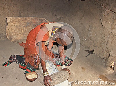 Datoga Woman Grinding Corn Editorial Stock Photo