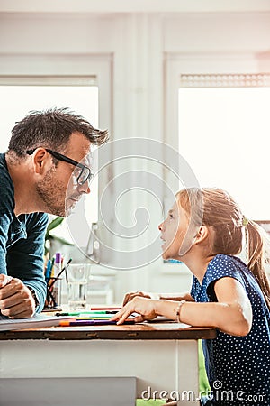 Daughter confronts to father Stock Photo