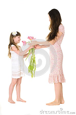 Daughter gives her mother bouquet Stock Photo