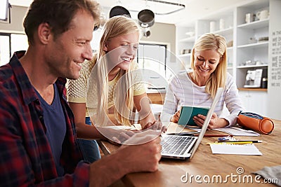 Daughter helping her parents with new technology Stock Photo