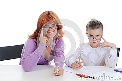 Daughter and mother makes lessons. Stock Photo