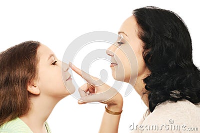 Daughter and mother playing Stock Photo