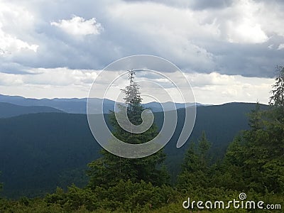 Mountains from afar, as if in one area Stock Photo