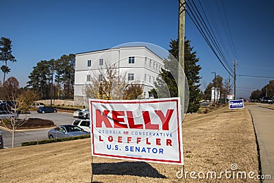 David Perdue Kelly Loeffler senate election signs in on a lawn on Belair road 2021 Editorial Stock Photo