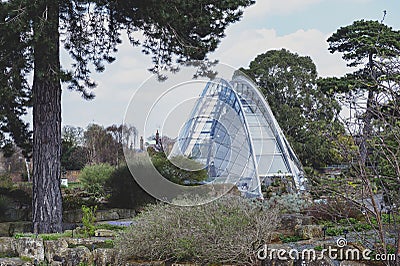 Davies Alpine House, modern building designed to provide perfect condition for alpine plants, located in Kew Gardens, London, UK Editorial Stock Photo