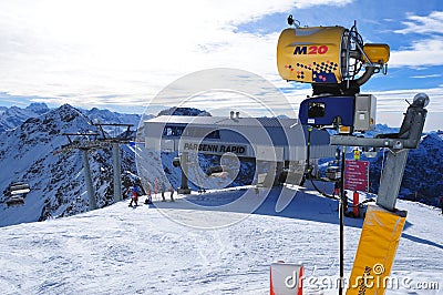 Davos: Due to the global clima change snow machines have to provide the ski-areas with artificial snow Editorial Stock Photo