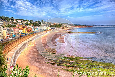 Dawlish Devon England with beach railway track and sea on blue sky summer day in HDR Stock Photo