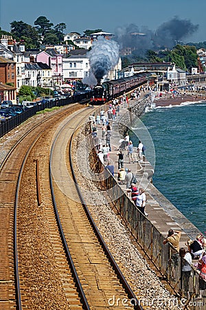 Dawlish England. Kings class steam train on coastal rail line Editorial Stock Photo