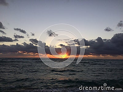 Dawn above Pacific Ocean - View from Kapaa Beach Park on Kauai Island, Hawaii. Stock Photo