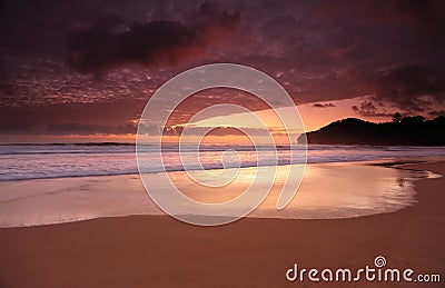 Dawn colours at Warriewood Beach Stock Photo