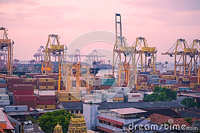 Dawn on the container terminal of the cargo port of Colombo Editorial Stock Photo