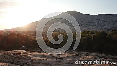 Dawn over frozen lava and mountains. Stock Photo