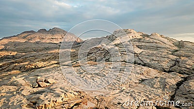 Dawn over frozen lava and mountains. Stock Photo