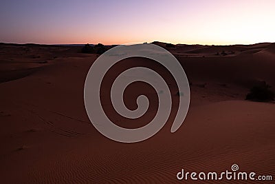 Dawn in the Sahara desert. Empty dunes landscape Stock Photo