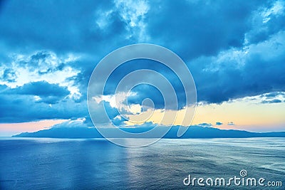 Dawn at Sea Island clouds Stock Photo