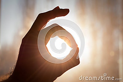 Hand silhouette showing okay sign Stock Photo