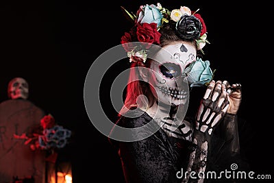 Day of the dead skull model with body art Stock Photo