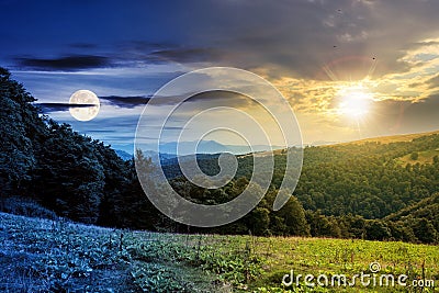 Day and night time change concept above countryside landscape Stock Photo