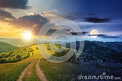 day and night time change concept above road through meadow in mountains Stock Photo
