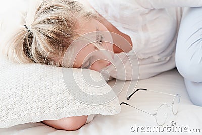 Day sleep relaxation woman sleep curling glasses Stock Photo