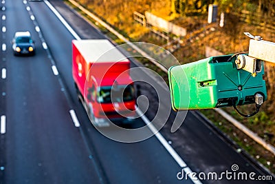 Day view of average speed traffic camera over UK Motorway Stock Photo