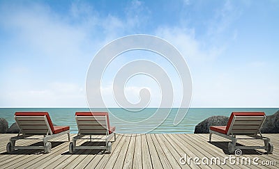 Daybed on wooden terrace at sea view Stock Photo