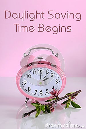 Daylight savings time begins clock concept for start at Spring with text Stock Photo