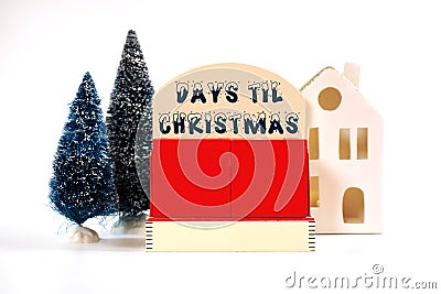 Days til Christmas vintage style wood calendar on white background. Stock Photo