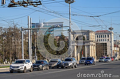 Daytime transport traffic at The Great National Assembly Square in Chisinau, Moldova Editorial Stock Photo