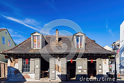 Daytime view of the beautiful historical Lafitte`s Blacksmith Shop Bar at French Quarter Editorial Stock Photo