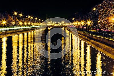 Dazzling lights by the river Stock Photo