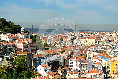 25 de Abril Bridge and Alfama, Lisbon, Portugal Stock Photo