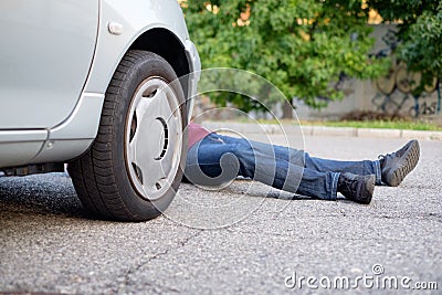 Dead pedestrian after a car accident Stock Photo