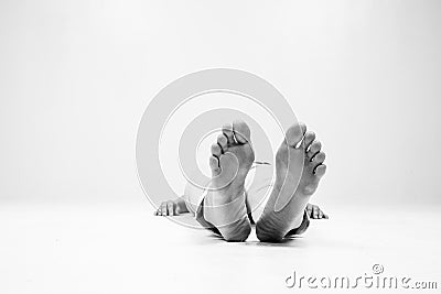 Dead person. Focus at the Feet Stock Photo