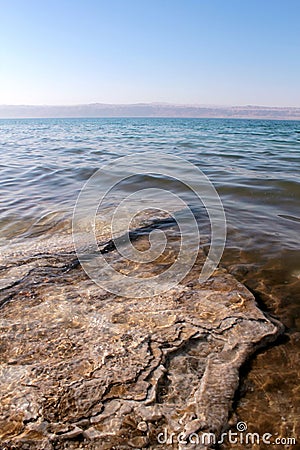 Dead Sea coastline, salt crystals in sand Stock Photo