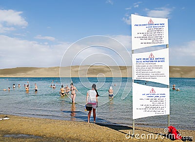 Dead Sea. People swim and sunbathe. Editorial Stock Photo