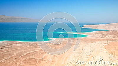 Dead Sea salt lake surface shore and beach Stock Photo