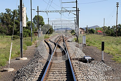 Dead straight railroad line Stock Photo