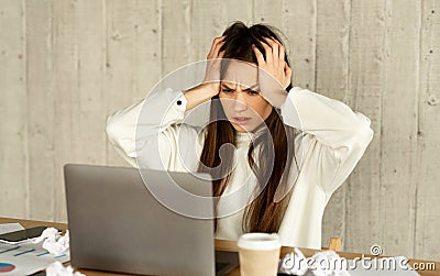 Freelance woman horrified by amount of work Stock Photo