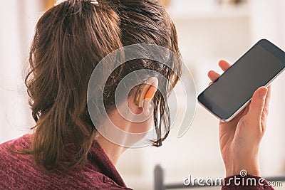 Deaf woman using smartphone Stock Photo