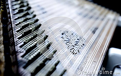 Deail from kanun, a Turkish classical music instrument played on laps Stock Photo