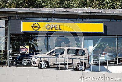 The dealership of German Opel cars in Ostrava with showroom, displayed cars and a yellow logo Editorial Stock Photo