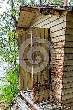 Deatil of an old wooden changing cabin on the shore of the Saimaa lake in Finland - 4 Stock Photo