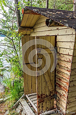 Deatil of an old wooden changing cabin on the shore of the Saimaa lake in Finland - 3 Stock Photo