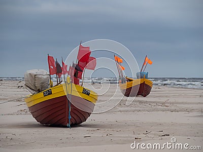 Debki beach, colorful fishing boats at the seashore. Poland Editorial Stock Photo