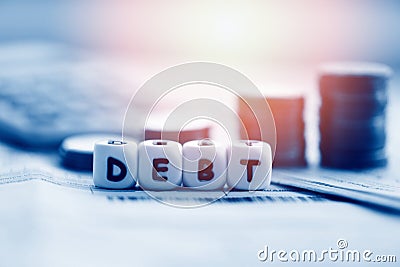 Debt credit card and money coin stack / Increased liabilities from exemption debt consolidation of financial crisis and problems Stock Photo