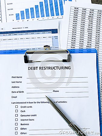 Debt restructuring document with graph on table. Stock Photo