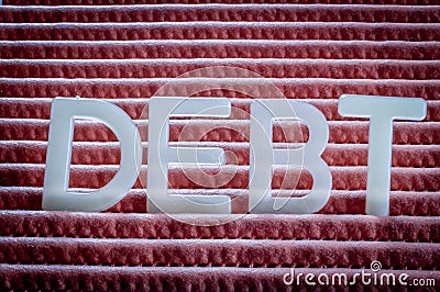 Debt, the state of owing money Stock Photo