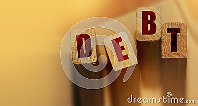DEBT word made with wooden blocks. Liability unprofitable business or personal loss concept Stock Photo