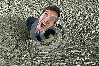 Debtor with money is falling in black hole. Bankruptcy concept Stock Photo